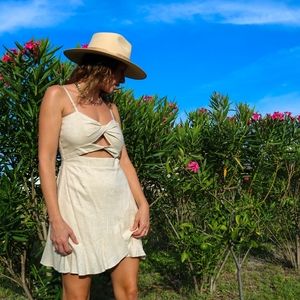 Runaway the label nude mini dress. Front cut outs.